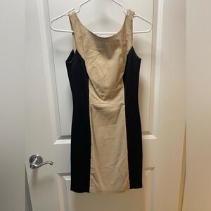 Bodycon dress with leather inserts. Size XS